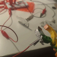 Getting back the claw this time, actually holding the aluminum foils as an interaction, I found it kind of similar to shooting games when you need to hit objects.